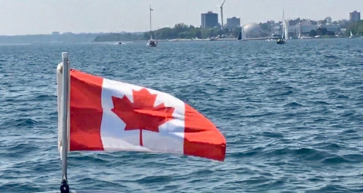 https://dateideascanada.com/wp-content/uploads/2020/07/Canadian-Flag-on-Boat-Lake-Ontario-1200x640.jpg