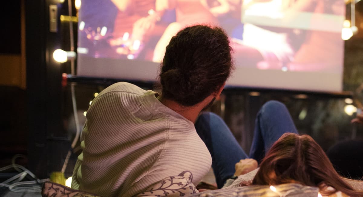 Couple Watching Movie - Date Ideas Canada